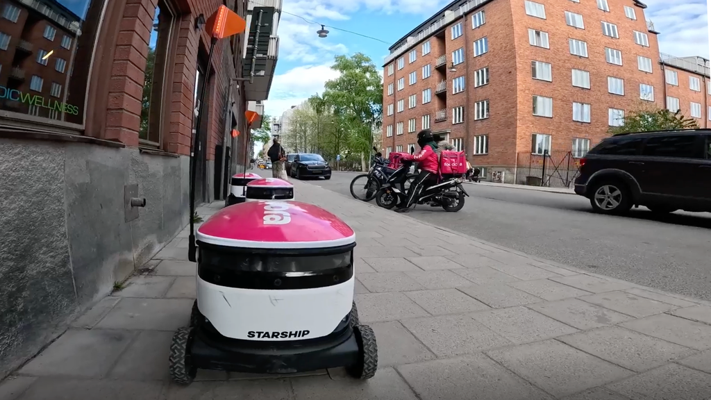 A photo of a Starship robot on the streets of Stockholm, Sweden